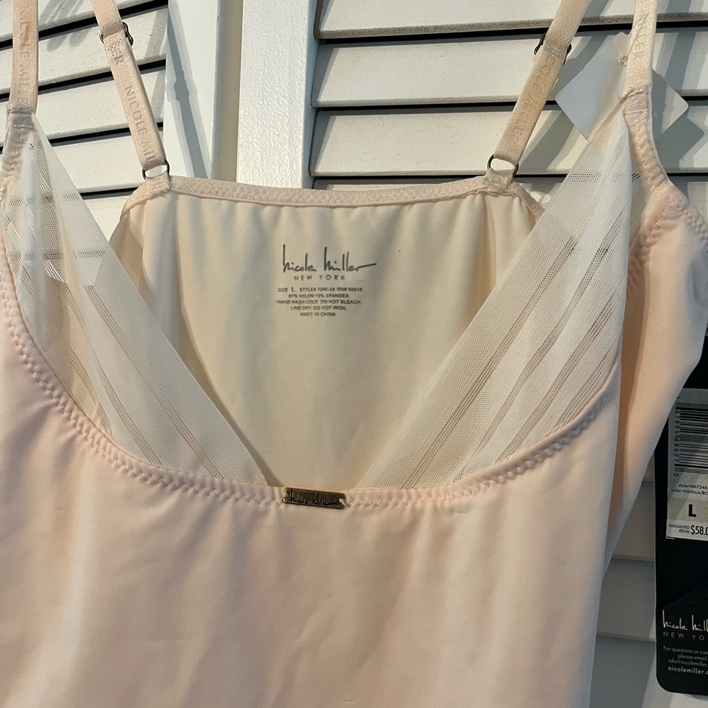 Nicole Miller body suit. never worn.